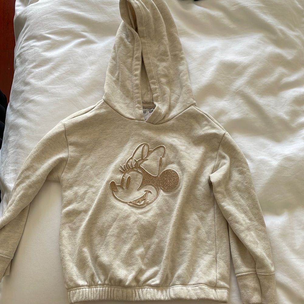 Gold Minnie Mouse sweatshirt from Gap.